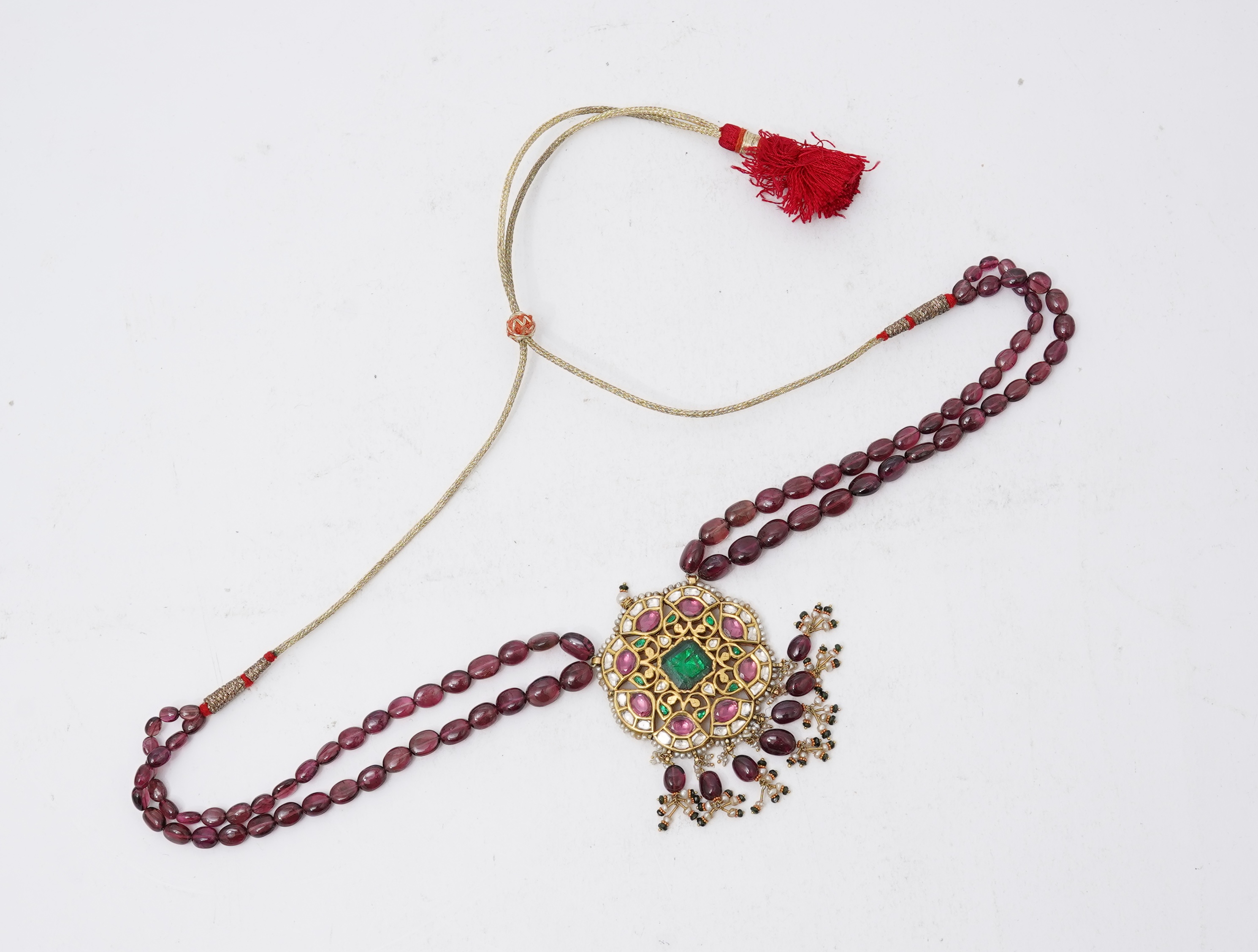 A tourmaline, emerald, seed pearl and diamond necklace, India, 20th century